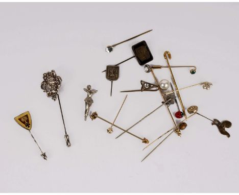 A collection of tie pins. 