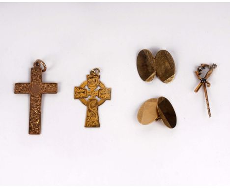 A pair of 9ct gold double sided oval cuff links with engine turned decoration, and two 9ct gold crosses. 12.6g 