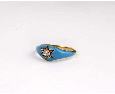 An enamel and diamond Victorian ring in unmarked yellow metal set with central old cut diamond with a surround of rose cut di