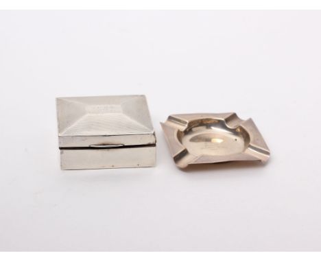 A sterling silver square cigarette box, with engine turned decoration and cedar lining; together with a sterling silver ashtr