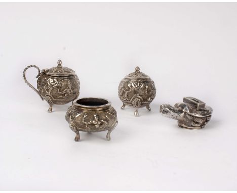 An Indian white metal condiment set with cast decoration together with a Chinese white metal model of a turtle. 4.6ozt. 