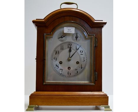 A 17" MAHOGANY CASED BRACKET STYLE CHIMING MANTLE CLOCK WITH SILVER DIAL     