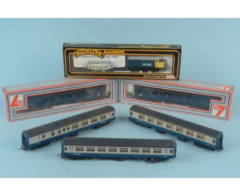 Two boxed Lima model coaches, a Mainline Railways Class 56 Co-Co diesel loco and three loose carriages
