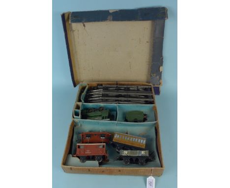 A boxed Hornby No.601 goods set, clockwork engine, tenders and track (playworn condition and box much distressed)