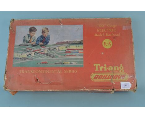 Boxed Triang Transcontinental R7X set circa 1950's/60's, includes engine, carriages, tender and track (playworn condition and