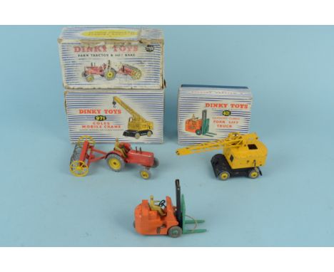 Various boxed Dinky Toys comprising 971 Colesmobile Crane, 401 Coventry Climax Forklift Truck and 27AK Farm Tractor and Hay R