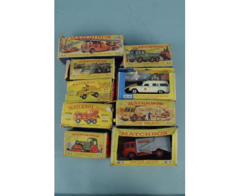 Nine boxed Matchbox K-Series vehicles including fire engine, crane, breakdown truck etc, all playworn and damage to boxes