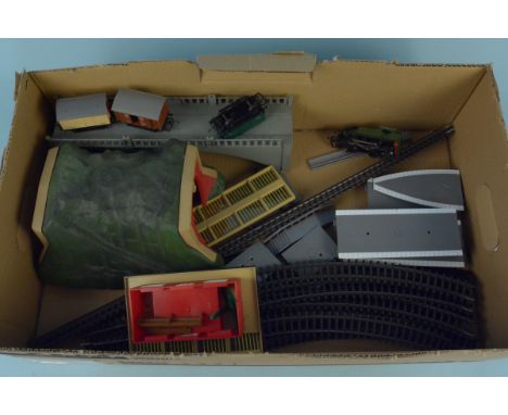 A loose selection of Triang railroad accessories including tunnel and bridge, track and a small engine