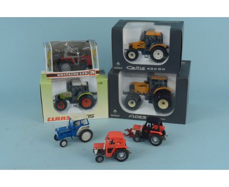 Two boxed Renault tractors 'Atles Roues Jumelees' and Celtis 456RX, a Britains Ltd Massey Ferguson 9522 tractor, a 'Claas Cel