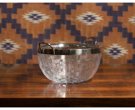 A cut glass bowl, c.1910, basket weave cut decoration with silver plated rim and handles,22.5cm diameter14.5cm highCondition 