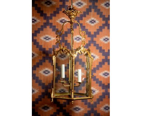 A Regency style gilt bronze hexagonal lantern, c.1860, with a three light fitting35cm wide67cm high