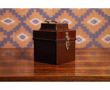 A toleware tea caddy, c.1910, English, painted in a deep claret, with brass fittings17cm wide17cm deep21cm high