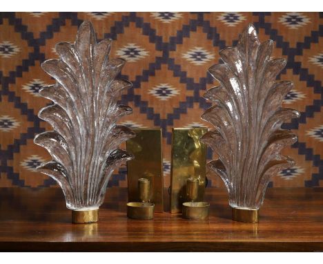 A pair of Murano clear glass wall lights, of recent manufacture, Italian, of leaf moulded form28cm wide51cm high (2)Condition