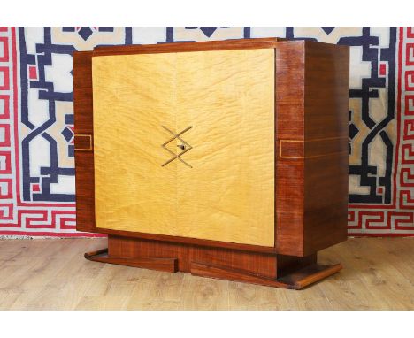 An Art Deco rosewood and ash cabinet c.1935, French, 120cm wide46cm deep102cm highCondition ReportOverall the condition is ve