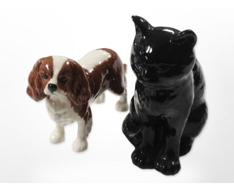 A Beswick spaniel and a Sylvac figure of a cat, tallest 17.5cm.