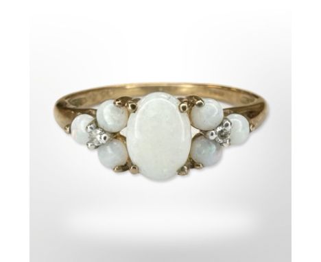 A 9ct yellow gold opal cluster ring, size N CONDITION REPORT: 1.6g.