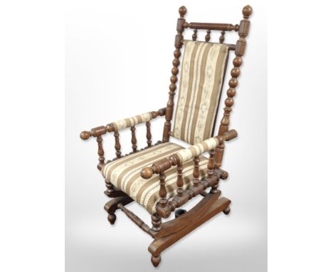 A 20th century Scandinavian bobbin turned beech rocking chair