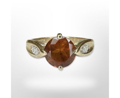 A 9ct yellow gold ring set with synthetic stones, size N/O. CONDITION REPORT: 2.9g.