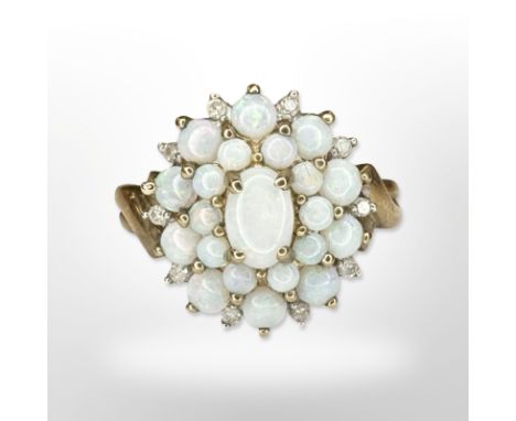 A 9ct yellow gold opal cluster ring, size N/O CONDITION REPORT: 3.1g.