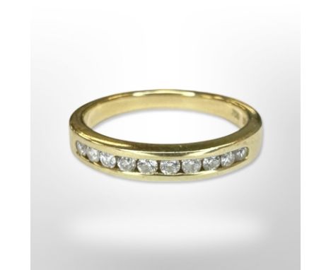 An 18ct yellow gold diamond half eternity ring, size N CONDITION REPORT: 3.8g.