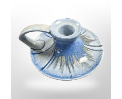 A Shelley blue-glazed porcelain chamber stick, diameter 11cm.