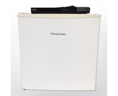 A Russell Hobbs bench top freezer and an LG DVD/CD player with lead and remote  