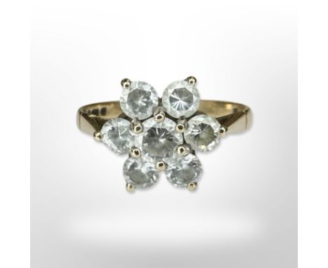 A 9ct yellow gold cluster ring set with synthetic stones, size N/O CONDITION REPORT: 2.5g.