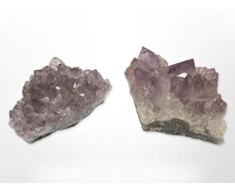 Two pieces of Amethyst rock crystal, each approximately 9 cm x 6 cm.