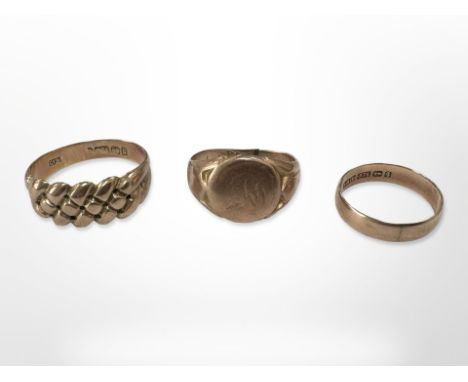 Two 9ct yellow gold Gent's rings (one Af) and a further 9ct band ring. (3) CONDITION REPORT: 9.6g.