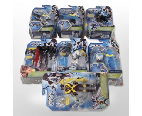 Seven Mattel Max Steel figurines, boxed.