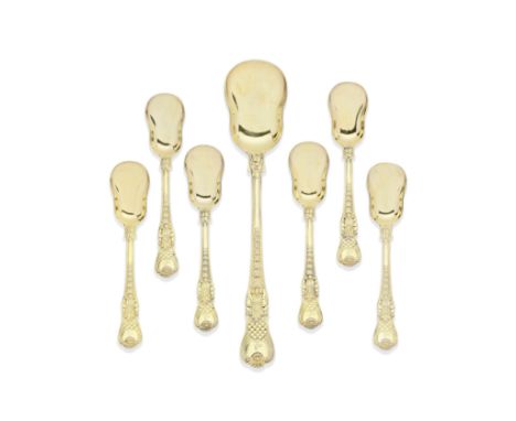 A George III silver-gilt dessert servicePaul Storr, London 1817 Coburg patter, comprising a large ice spade and six spoons, c