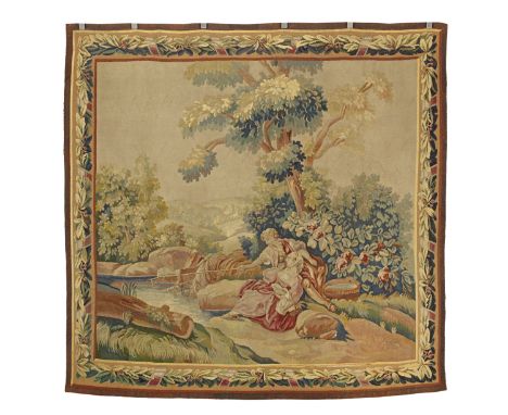 An Aubusson tapestryFrance, probably late 18th centurythe background based on a Flemish verdure design, the young couple fish