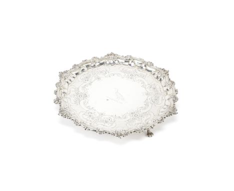 A George II silver salverWilliam Peaston, London 1751Shaped-circular with leaf scroll border, centre chased with rococo scrol