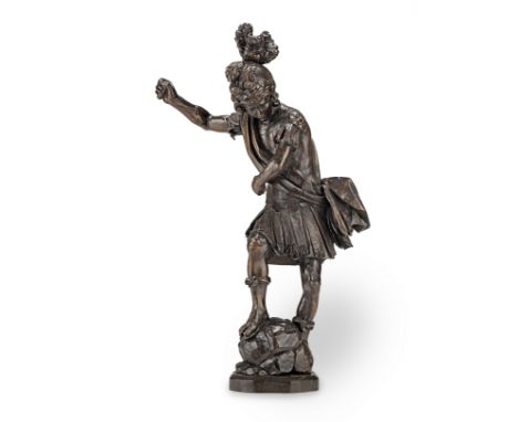 A carved oak figure of a Roman soldier, probably 18th centuryin naturalistic pose, his right arm raised and looking downwards