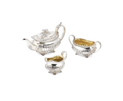 A George IV three-piece silver tea serviceGeorge Burrows, London 1821 With gadrooning and floral embossed decoration, the tea