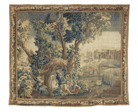 A charming Flemish Verdure Tapestrymid to late 18th centurythe border containing various flora and fauna, the main field depi