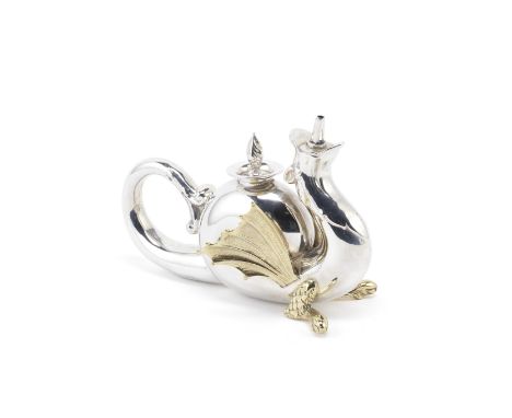 A silver and silver-gilt novelty lighterSynyer &amp; Beddoes, Birmingham 1923Modelled as a dragon, the raised head forming th