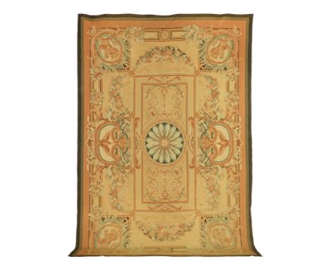 A charming Aubusson tapestry,France, early 19th centurythe golden ground adorned with colourful garland swags and central gre