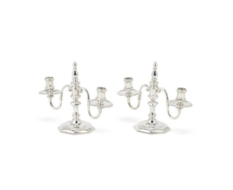 A pair of silver three-light dwarf candelabraRichard Comyns, London 1936 With octagonal bases and removable nozzles and drip-