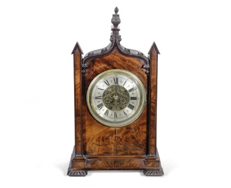 A mid 19th century mahogany bracket clock in the Gothic stylethe dial signed J. Hutton, Londonthe rectangular case with folia