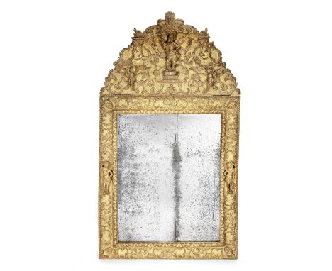 A Louis XIV giltwood and gilt gesso mirrorlate 17th centuryProbably circa 1675, the rectangular bevelled plate within an oppo