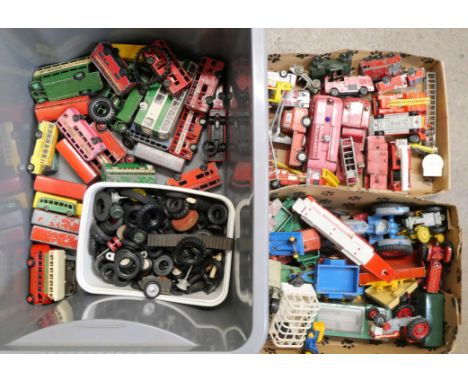 A collection of die-cast model vehicles, fire engines, buses and tractors and a collection of tyres