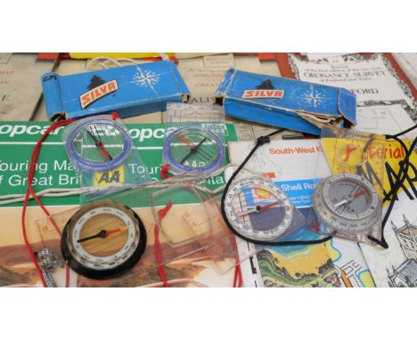 Ordnance Survey and other maps and seven compasses 