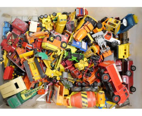 A collection of die-cast model vehicles, mainly construction, playworn