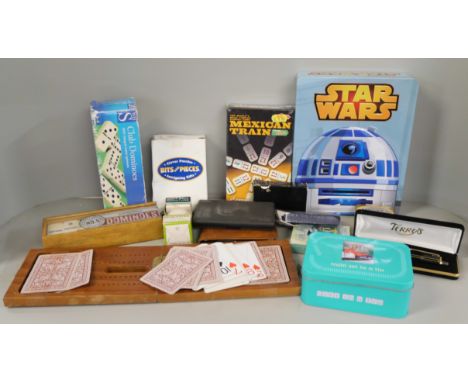 A collection of games including dominoes, playing cards and Star Wars lights in a tin **PLEASE NOTE THIS LOT IS NOT ELIGIBLE 