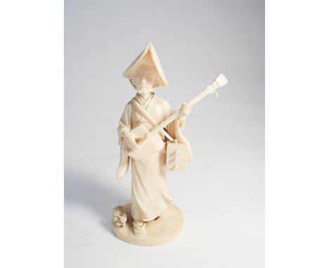 Meiji period Japanese carved ivory figurine of a female playing the lute height 15cms   Pegs missing from lute 