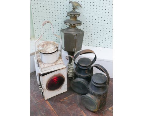 Three old railway lamps and a brass carriage type lamp 