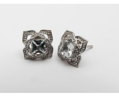 Pair of 9ct white gold stud earrings set in square Celtic knot shape with diamonds and white topaz 