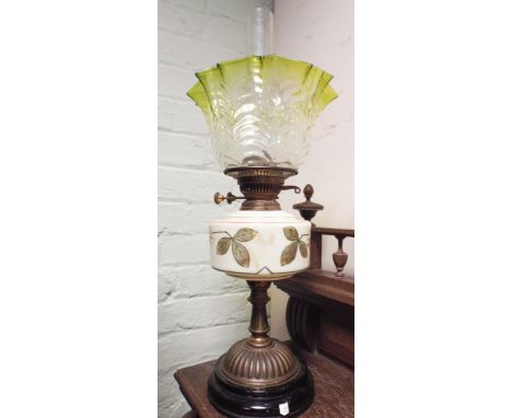 Victorian oil lamp with floral decorated bowl and green shade 