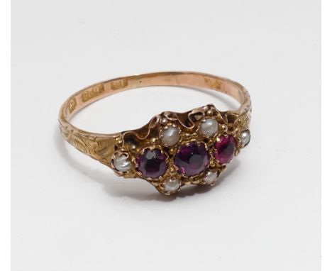 19th  century 15 ct gold ruby and pearl ring, with closed back setting, , hallmarked. ring size N  Gross weight 1.6 gram, rin